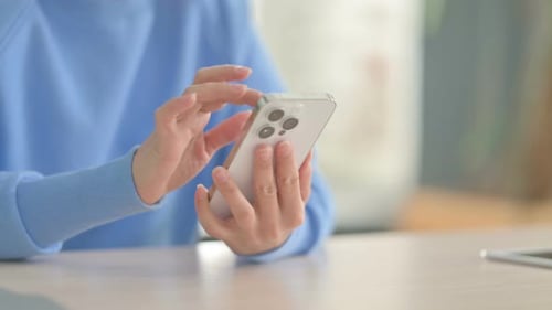 Close up of Indian Woman Browsing Internet on Tablet