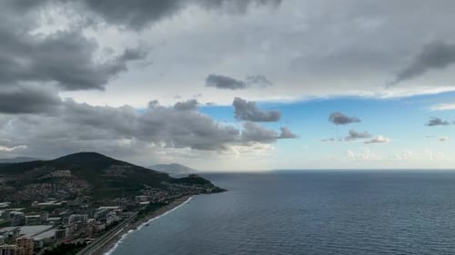 Most Beautiful Dramatic Clouds and Sky Over City and Sea