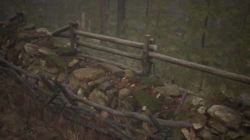An Old Wood Fence with a Country Field Behind It