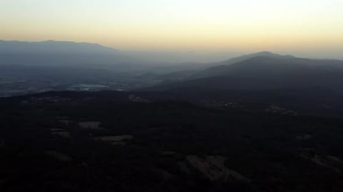 drone aerial shot of sunrise in carso hills