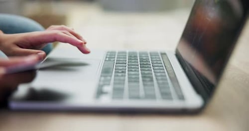 Close Up of Person Typing on Laptop