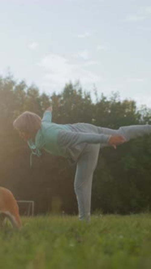 Active Senior Woman Doing Yoga Outside