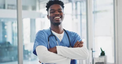 Happy black man, doctor and arms crossed of healthcare professional in confidence at the hospital