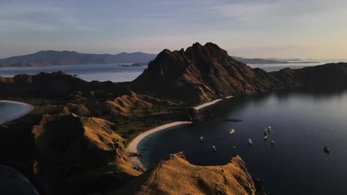 Vessels Moored On The Shoreline Of Padar Island In Komodo National Park, Labuan Bajo, Flores, Indone