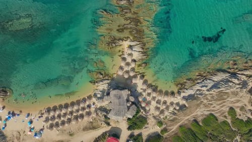 Cinematic Drone Flight Over a Bustling Beach Cove