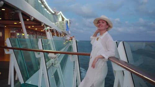 An Elegant Woman Finds Joy in the Relaxing Cruise Life at Sea