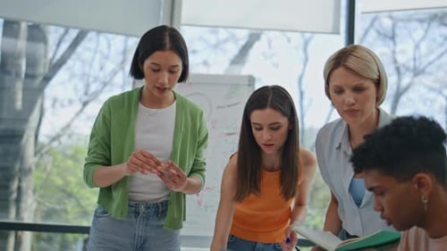 Creative Coworkers Discussing Work in Meeting Room Closeup Team Communicating