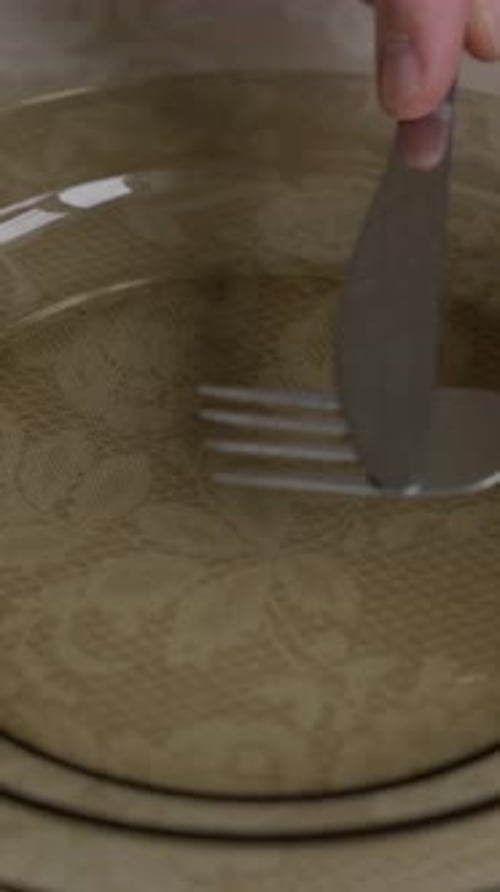 Fork Scraping on Glass Plate CloseUp