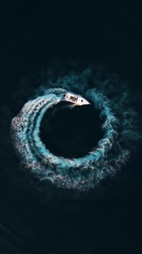 Motorboat Creates Circular Wake Pattern from Above