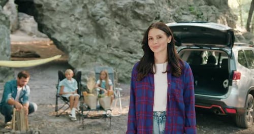 Happy Family Camping in a Rural Setting