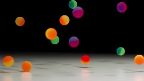 Vivid Spheres Falling and Bouncing on Gray Surface