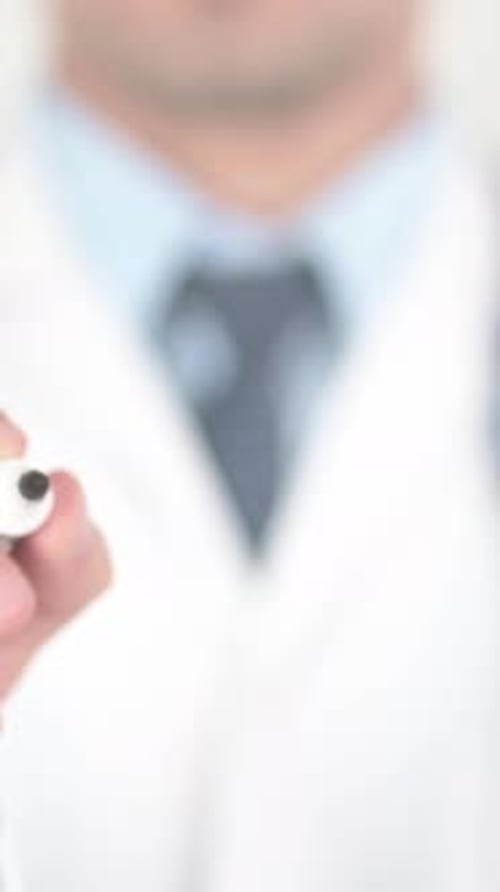 Doctor Writes Virus on Glass Healthcare Concept
