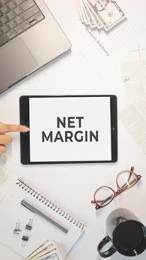 VERTICAL VIDEO OF NET MARGIN DISPLAYING ON A TABLET SCREEN