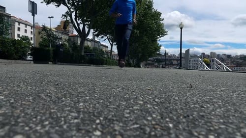 Man Jogging In City, Low Angle, Super Slow Motion 240fps