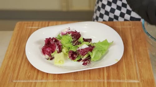 Salad Preparation: Tossed Green Salad with Dressing