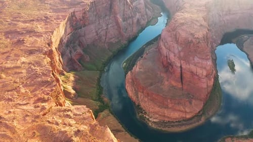 Cinematic shot , aerial drone view of famous Horseshoe Bend on the Colorado river and most iconic to