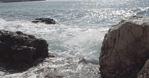 Waves of the ocean sea crashing Rocky Cliffs - Water Storm Splash and Spray in nature - Slow motion