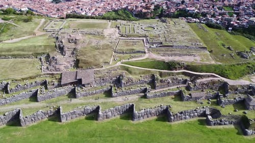 Aerial overview of terraced stone walls of Cusco the center of Inca culture