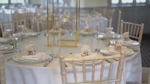 A view of a dinning tables well decorated in a banquet.