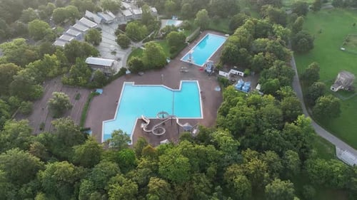 Aerial view of public pools surrounded by greenery, Germany.