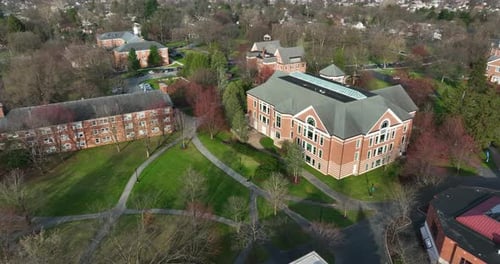 College university campus buildings in USA. Aerial of academic classroom and dorm building, student