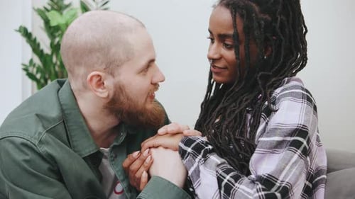 Loving Couple Shares Tender Moment at Home