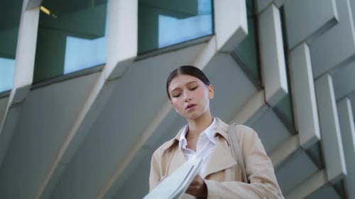 Woman Reading Newspaper Street Closeup