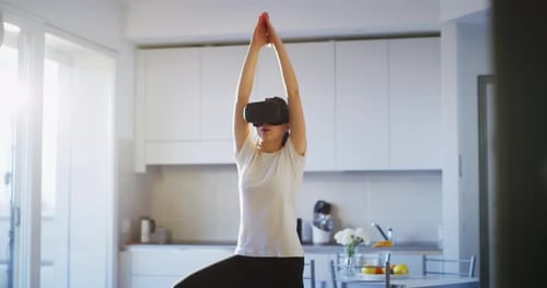 Young Woman Doing VR Exercise at Home