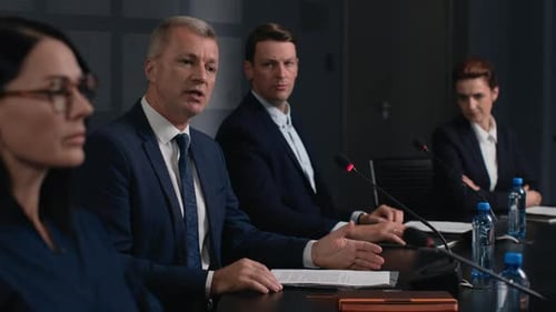 Political speaker delivers partnership speech at business forum convention hall