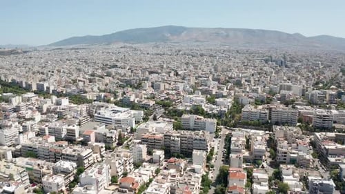 Aerial wide shot of the urban city of Athens, Greece