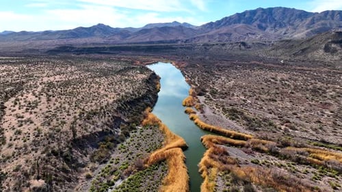 Aerial view of reservoir and river in desert landscape, United States.