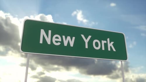 Welcome to New York. New York road sign on a blue sky. Travel, business, tourism and transport conce
