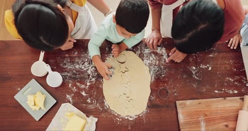 Top view, baking cookies and child with mother and grandmother, learning bakery skill with butter
