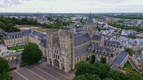 Ladies Abbey of Sainte-Trinité with Michel D'Ornano park, Caen in Normandy France. Aerial drone circ