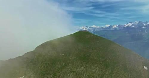 Drone Flies Over Green Picturesque Valley with Mountains in the Background High Mountains Famous