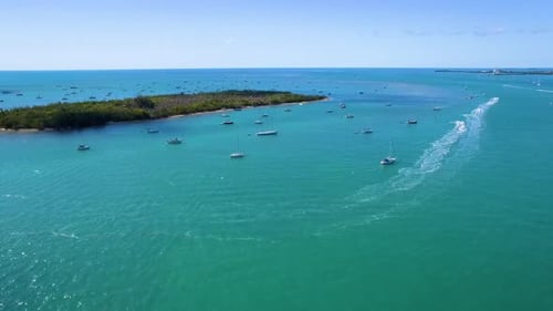 Sailboats Anchored Off Island Shore Aerial