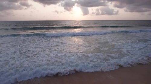 Beautiful Sunset with a View of the Sea and Clouds