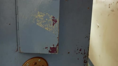 Opening A Prison Door Into A Cell.