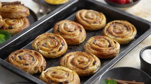 Golden Pastries Fresh from the Oven on Baking Sheet