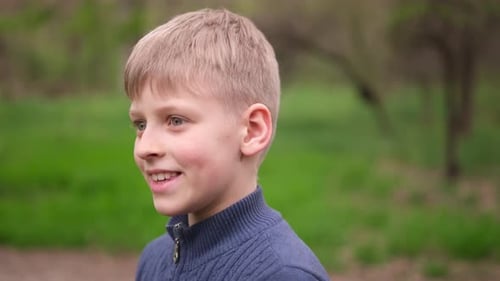 Closeup Portrait of Happy Little Child in City Park Kid Boy Outdoors Closeup Body Part Cute