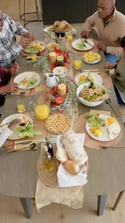 Family Gathering Enjoying a Meal at Home