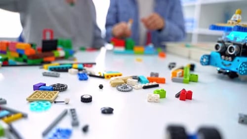 Robotics Programming Class Children Construct and Code Robot STEM Education Using Constructor Blocks