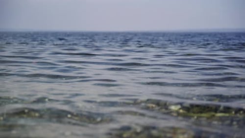 Small waves on the pebble beach