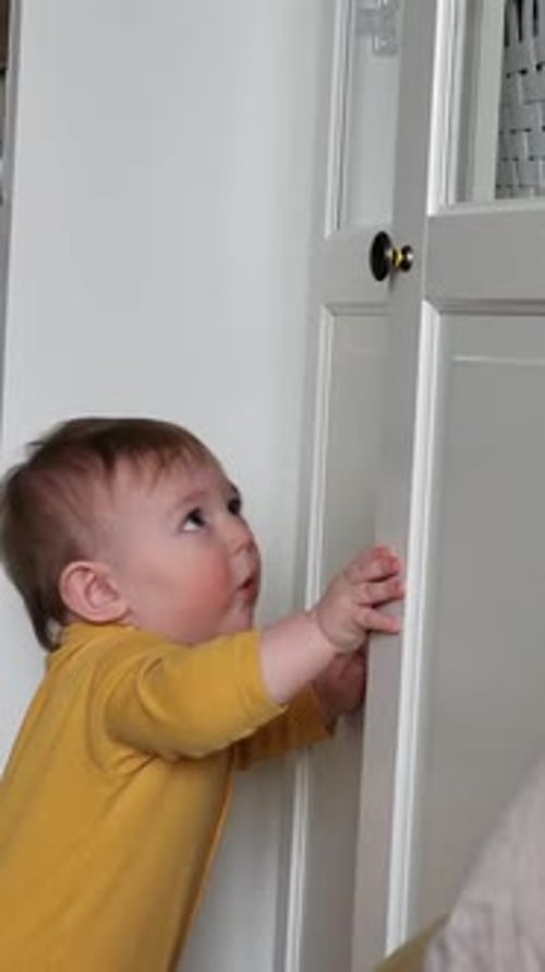 Baby Opens Door at Home