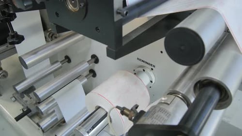 Roboti Machine Winds Paper Tape Rolls at Workshop