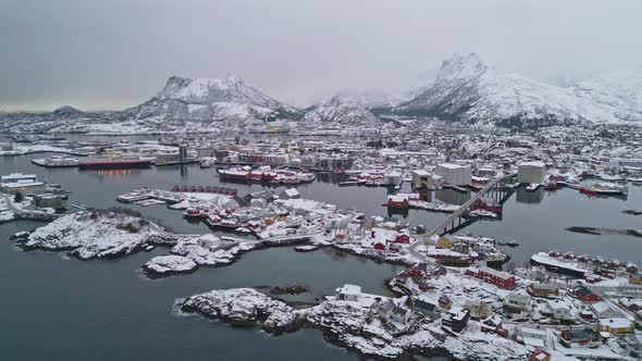 Aerial view of Svolvær harbor and snowy mountains in Lofoten, Norway ...
