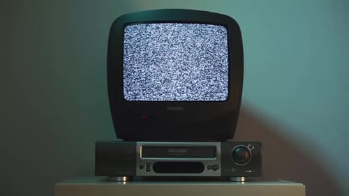 Dated TV with Screen Noise Nostalgic Nineties Retro Technology Concept