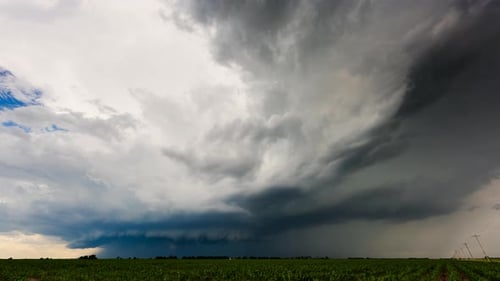 Storm Clouds Rolling over Farmland during Daytime