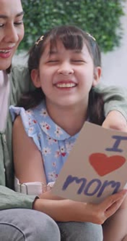 Woman and Child Celebrating a Birthday Together
