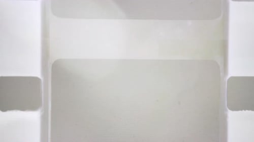 Retro Film Strip Grain Reveal Transition